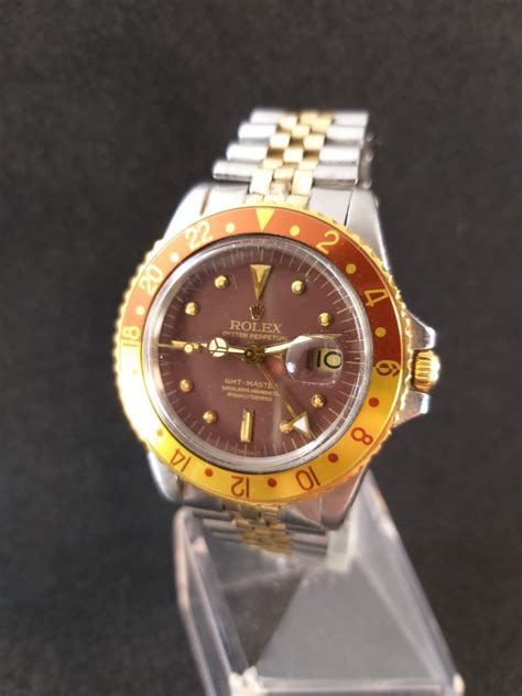 bracciale rolex 93450 su 1675 occhio di tigre|Rolex GMT 1675 Occhio di tigre : info e valutazione per acquisto.